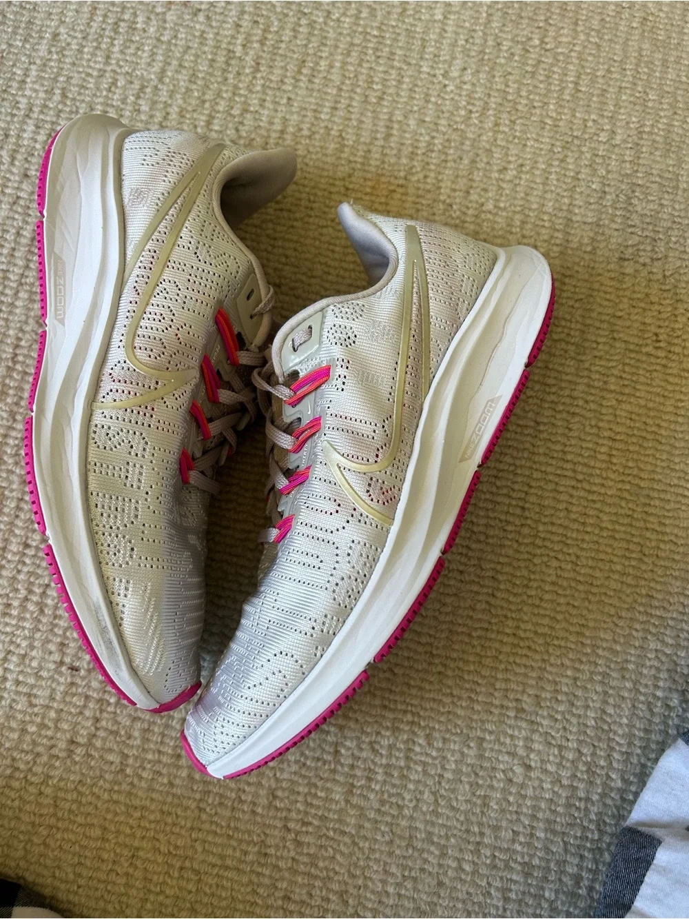 Nike Women's Light Beige Athletic Sneakers with Pink Accents